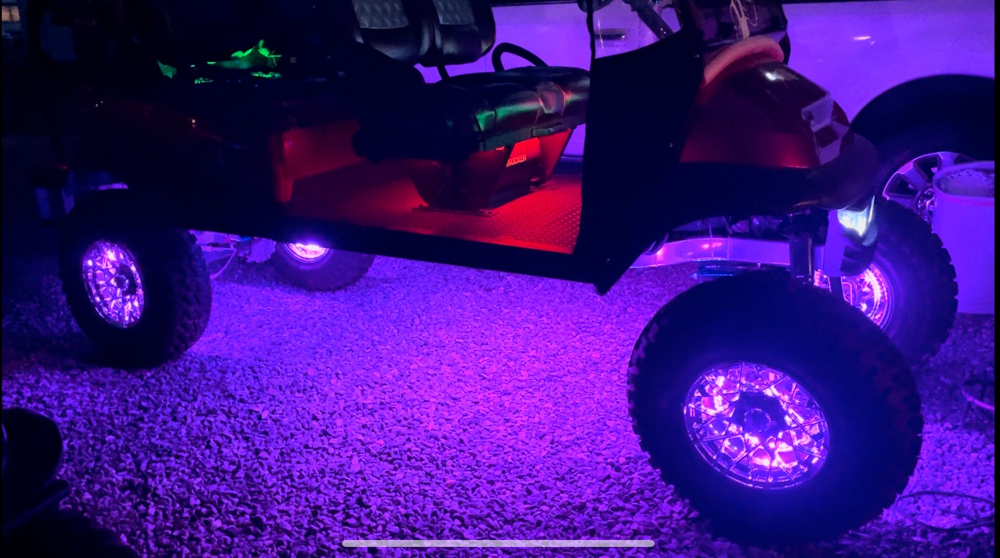 Fully waterproof golf cart wheel lights installed on Club Car